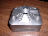 A .016 (1/64) inch diameter 
			ballnose cutter was used to CNC mill this swedge-trim die section.